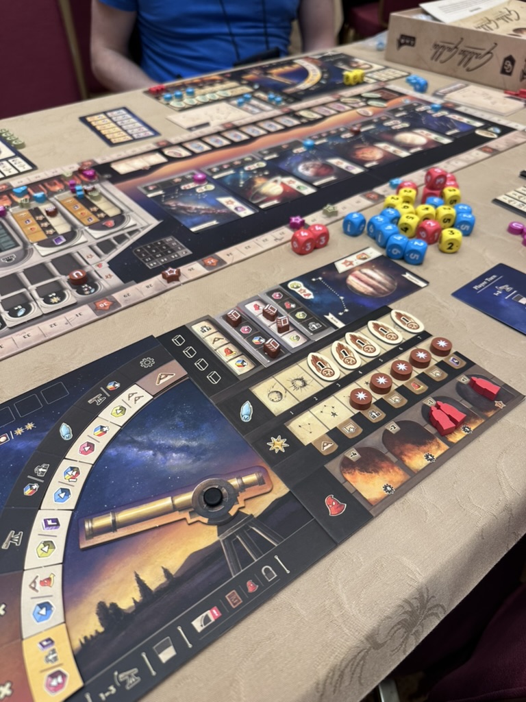 board game with a telescope and dice